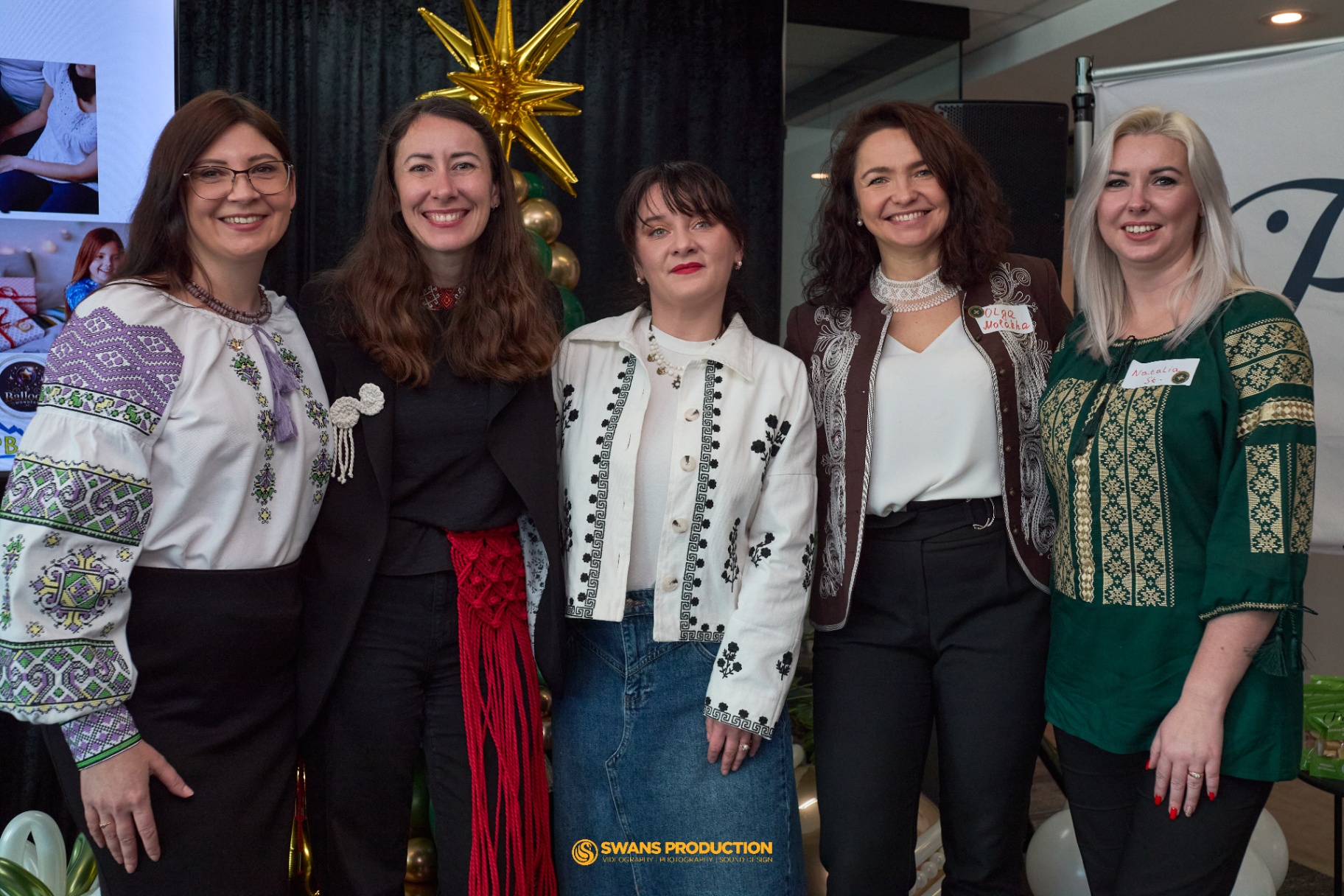 Organizing team of the Christmas Magic for Kids in Ukraine charity event wearing Ukrainian vyshyvanky
