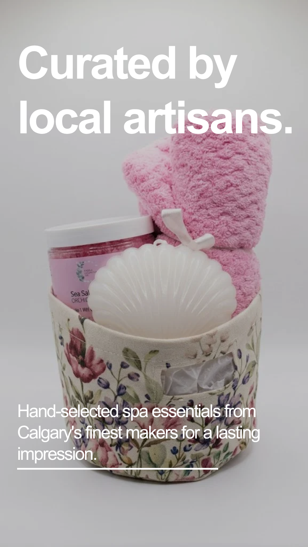 Finished ad with white headline reading Curated by local artisans over the gift basket